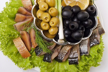 Image showing A composition with smoked herring pieces