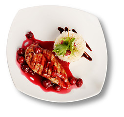 Image showing Delicious beef with cherry sauce. File includes clipping path fo