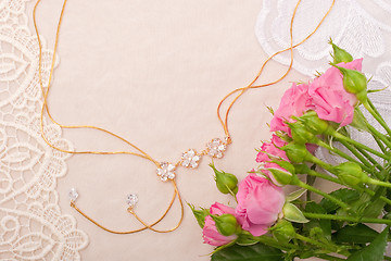 Image showing Chain and roses on lace background