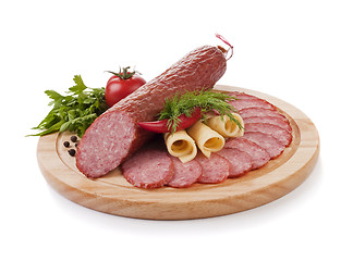 Image showing Sliced sausage with vegetables isolated