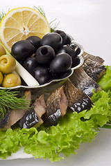 Image showing A composition with smoked herring pieces