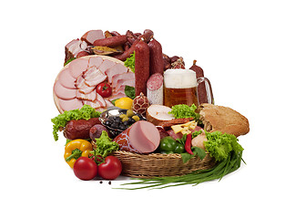 Image showing A composition of meat and vegetables with beer