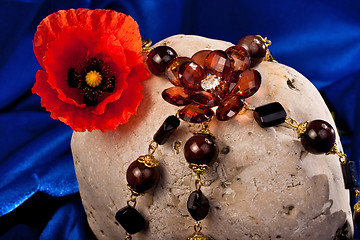 Image showing Necklace, flower and stone