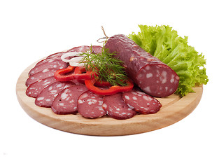 Image showing Sliced sausage with vegetables