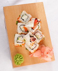 Image showing Sushi rolls wish shrimp and caviar