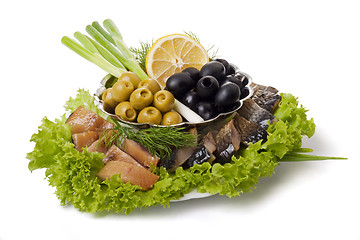 Image showing A composition with smoked herring pieces