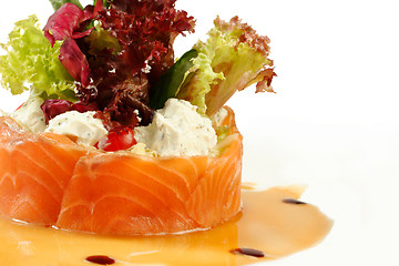 Image showing Salmon under sour cream closeup