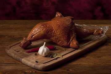 Image showing Smoked chicken thighs on the table