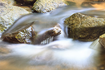 Image showing waterfall and rocks covered with moss