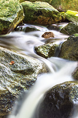 Image showing waterfall and rocks covered with moss