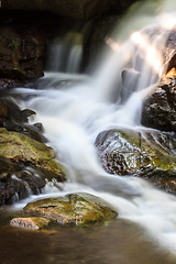 Image showing waterfall and rocks covered with moss