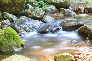 Image showing waterfall and rocks covered with moss