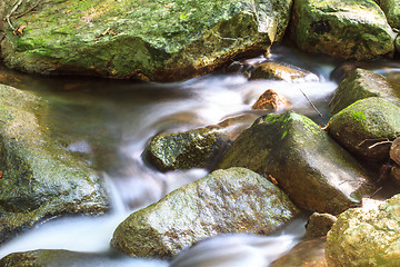 Image showing waterfall and rocks covered with moss