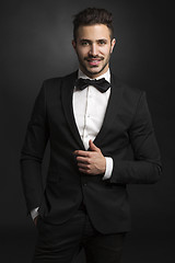 Image showing Latin man wearing a tuxedo