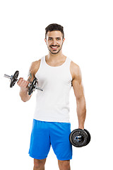 Image showing Athletic man lifting weights