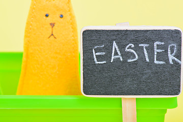 Image showing Blackboard with easter bunny on the background