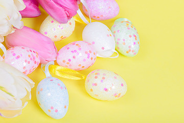 Image showing Easter multicolored tulips and eggs