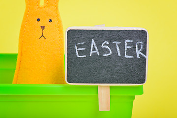 Image showing Easter Bunny in flower pot with blackboard