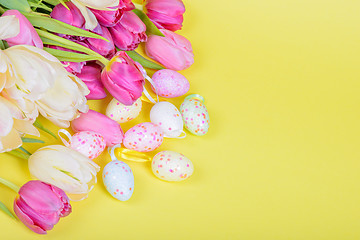 Image showing Easter multicolored tulips and eggs