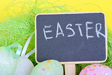 Image showing Miniature blackboard with easter eggs