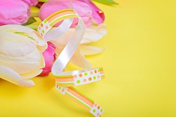 Image showing Easter ribbon with pink tulips