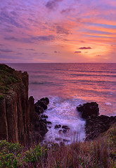 Image showing Beautiful sunrise highlights stunning volcanic sea cliffs