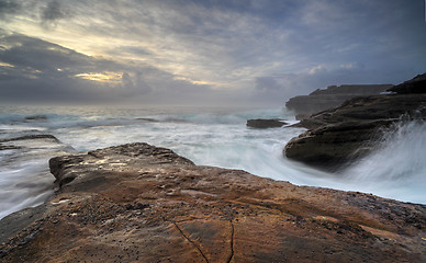 Image showing Moody sunrise and wild waves at Little Bay 