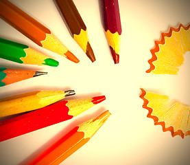 Image showing set of a old colored pencils with shavings