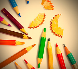 Image showing set of a vintage colored pencils with shavings