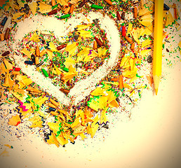 Image showing heart, yellow pencil and wooden chips