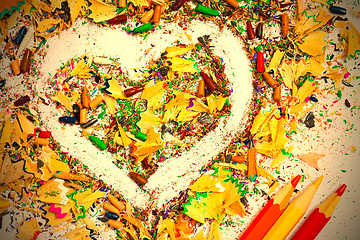 Image showing heart, multicolored pencils and varicolored shavings