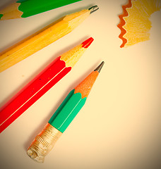 Image showing set of vintage colored pencils with chips