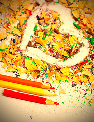 Image showing heart, three pencils and colored wooden shavings