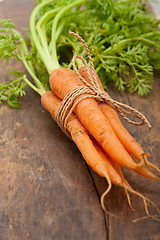 Image showing baby carrots bunch tied with rope