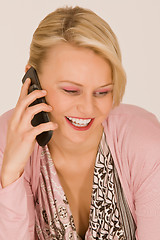 Image showing Young woman with mobile phone