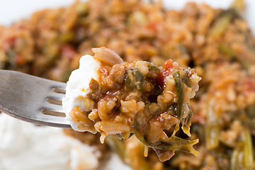 Image showing Eating mince and spinach