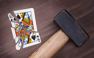 Image showing Hammer with a broken card, queen of spades