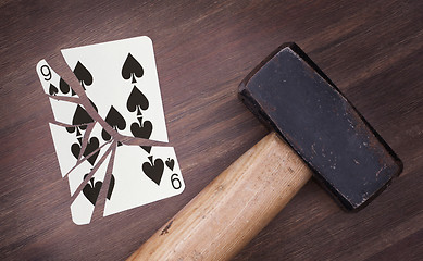 Image showing Hammer with a broken card, nine of spades