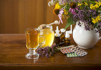 Image showing medicinal herbs, honey, herbal tea