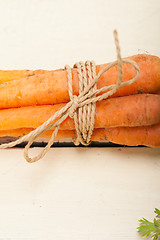 Image showing baby carrots bunch tied with rope