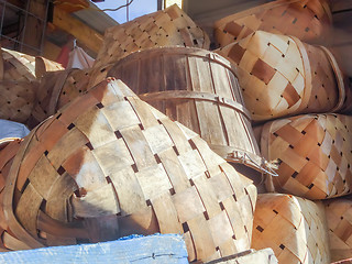 Image showing pile of empty baskets stack on farm