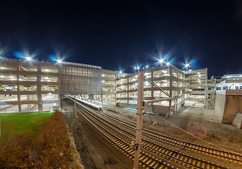 Image showing electro train intermodal terminal with parking at night