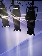 Image showing multiple spotlights on a theatre stage lighting rig