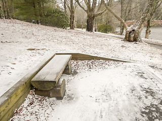 Image showing bench in Park in winter with snow 