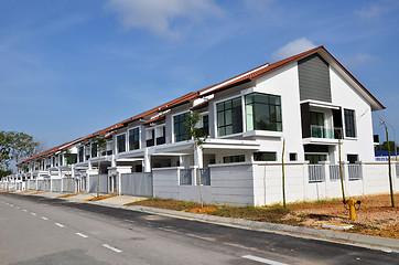 Image showing Terrace house under the blue skies