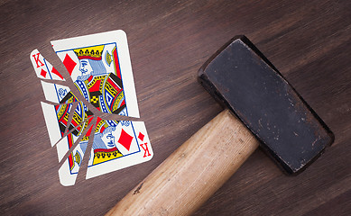 Image showing Hammer with a broken card, king of diamonds