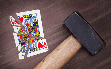 Image showing Hammer with a broken card, king of hearts