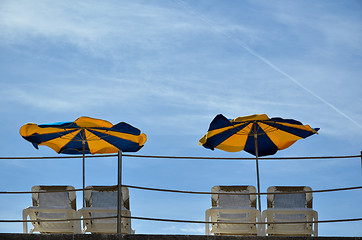 Image showing Colorful sun umbrellas