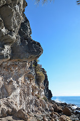 Image showing Tall cliffs and rocks by the coast