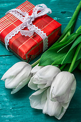 Image showing gift for your favorite background tulips